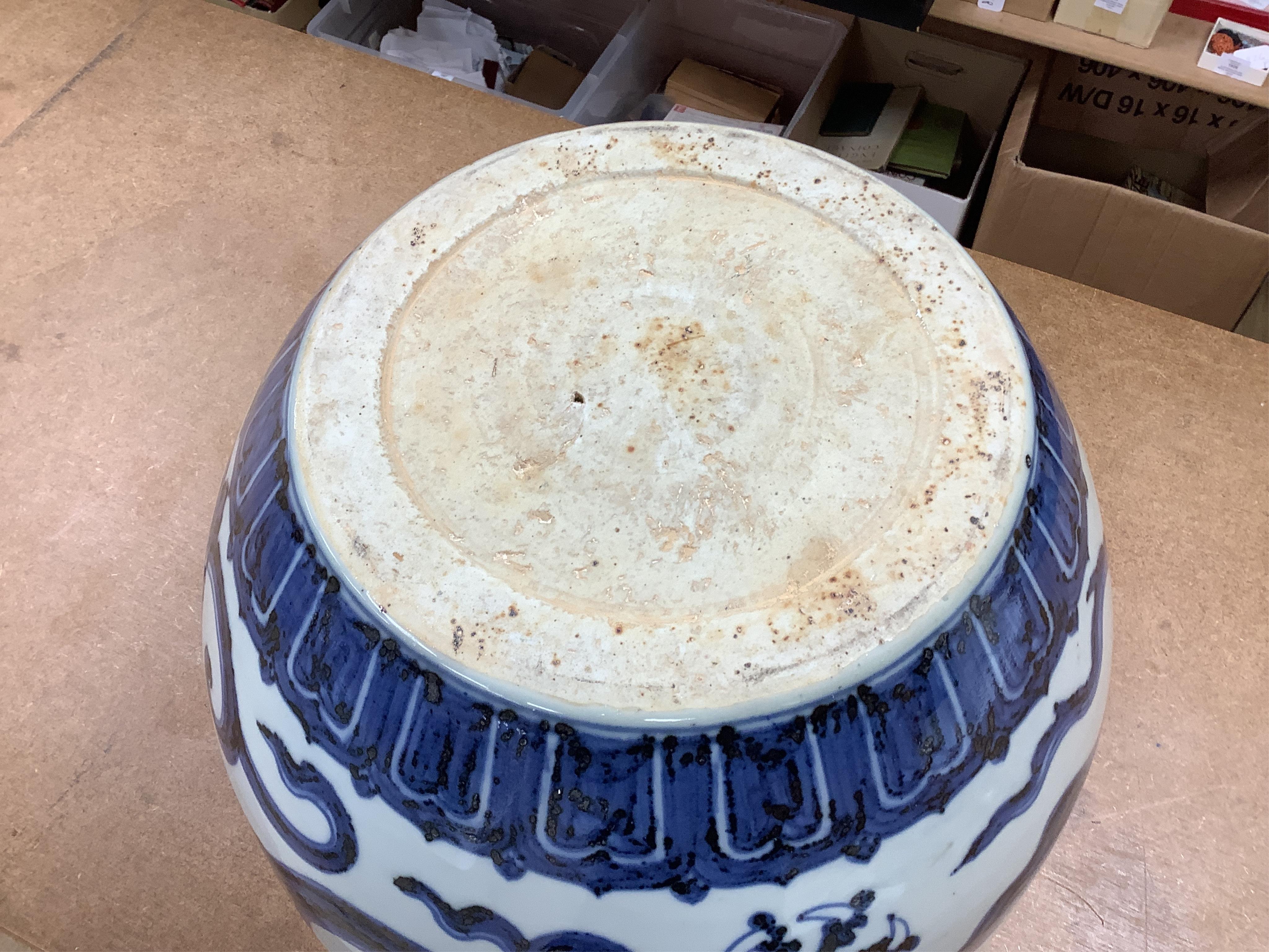 A Chinese large blue and white ‘dragon’ jar, 29cm. Condition - good